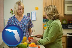 florida map icon and a nutritionist discussing food choices with client