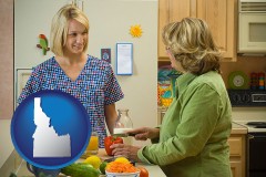 idaho map icon and a nutritionist discussing food choices with client