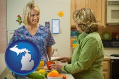 michigan map icon and a nutritionist discussing food choices with client
