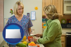 north-dakota map icon and a nutritionist discussing food choices with client