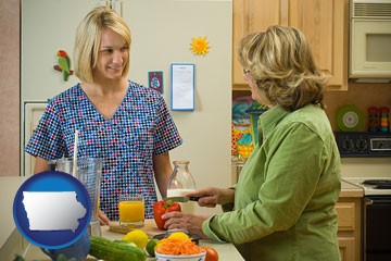 a nutritionist discussing food choices with client - with Iowa icon