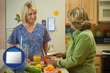 a nutritionist discussing food choices with client - with Wyoming icon