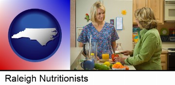 a nutritionist discussing food choices with client in Raleigh, NC